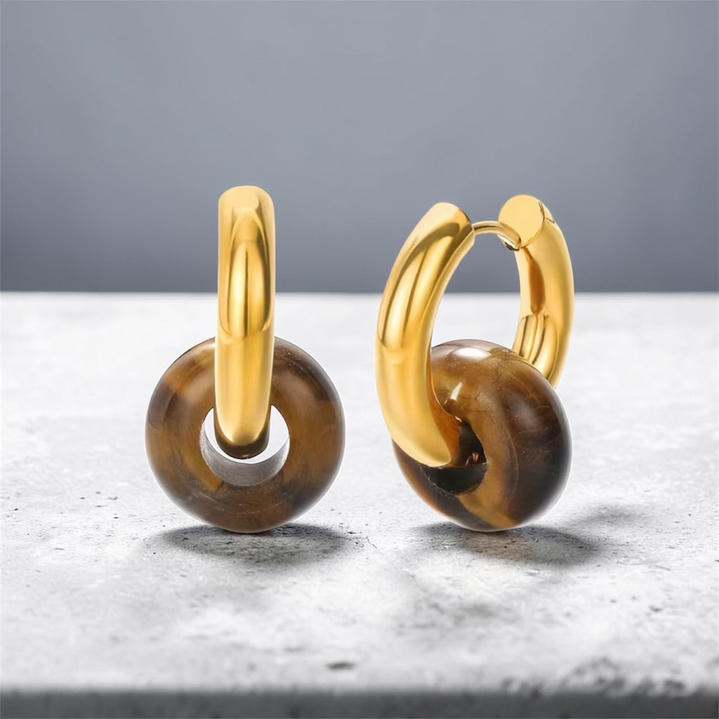 Arracadas doradas con piedra